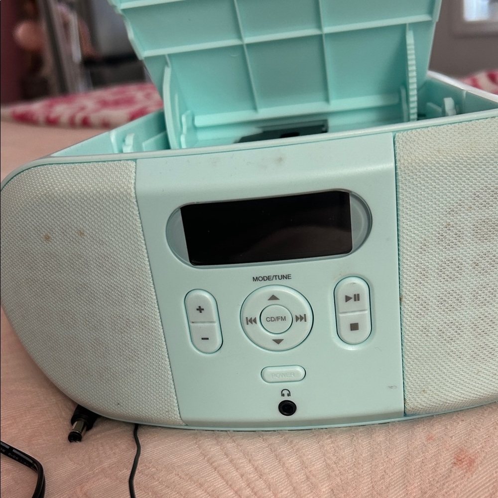 On Running Aqua Portable CD Player and radio station